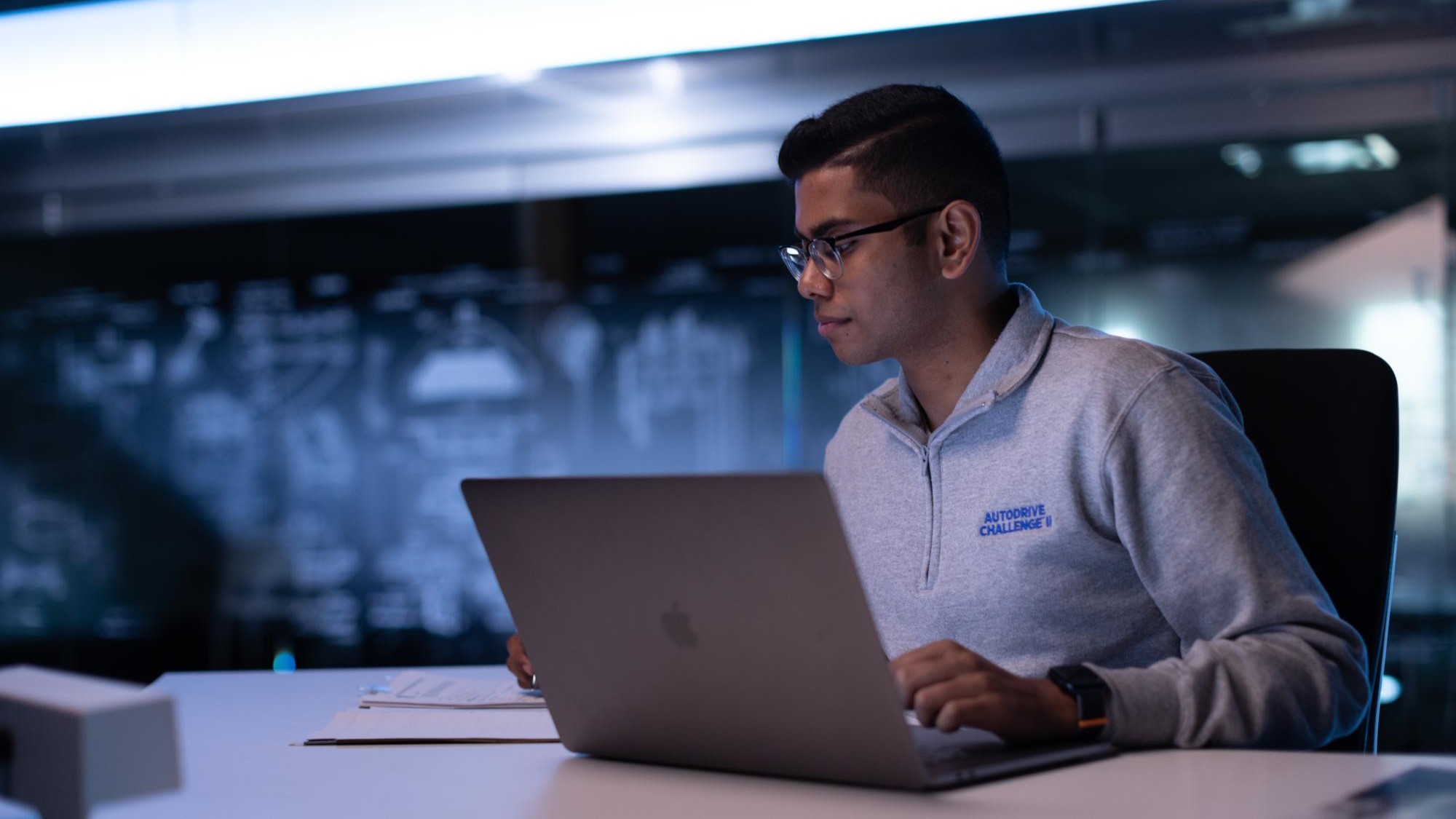 Computer Science study working on a laptop