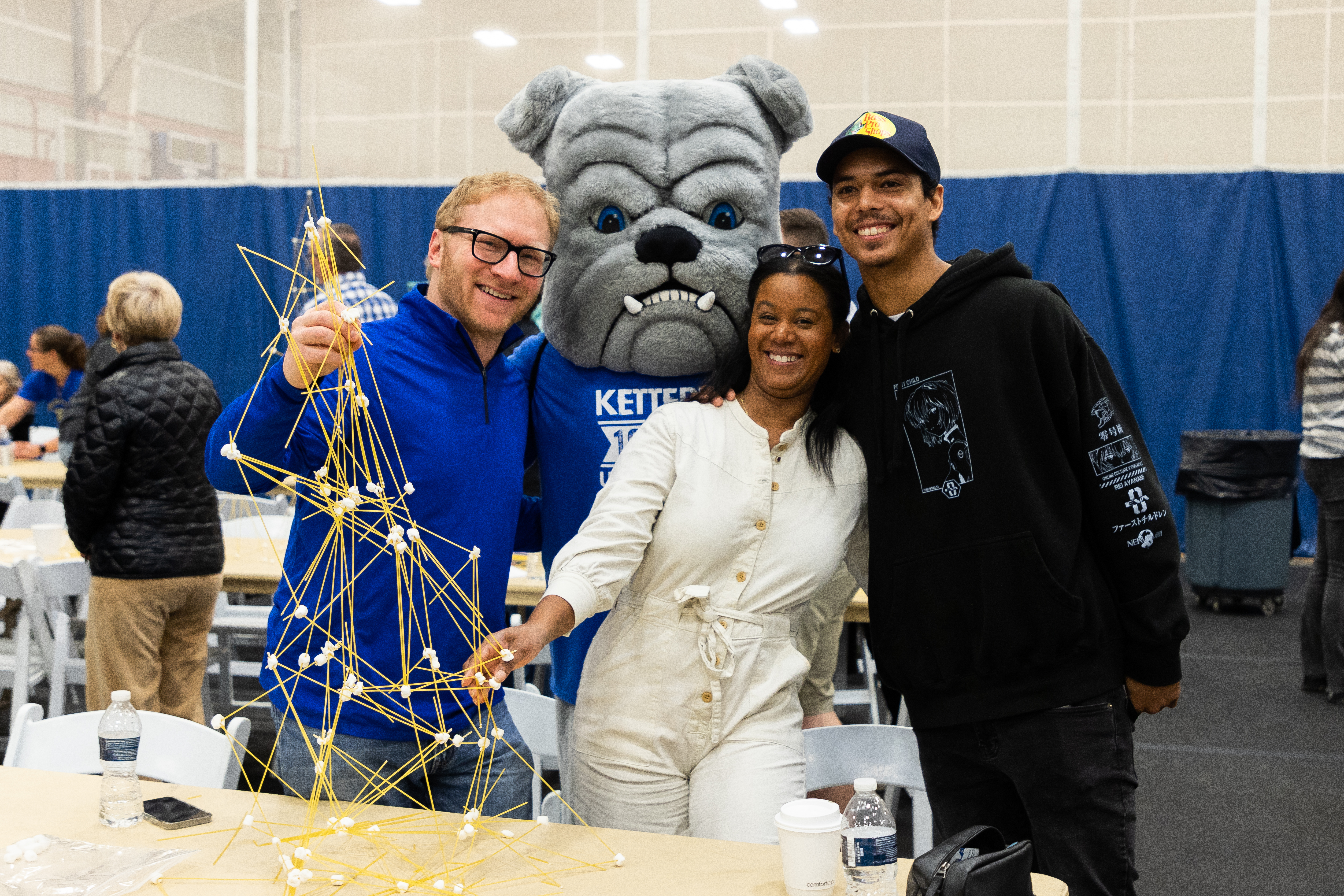 student with parents at family day