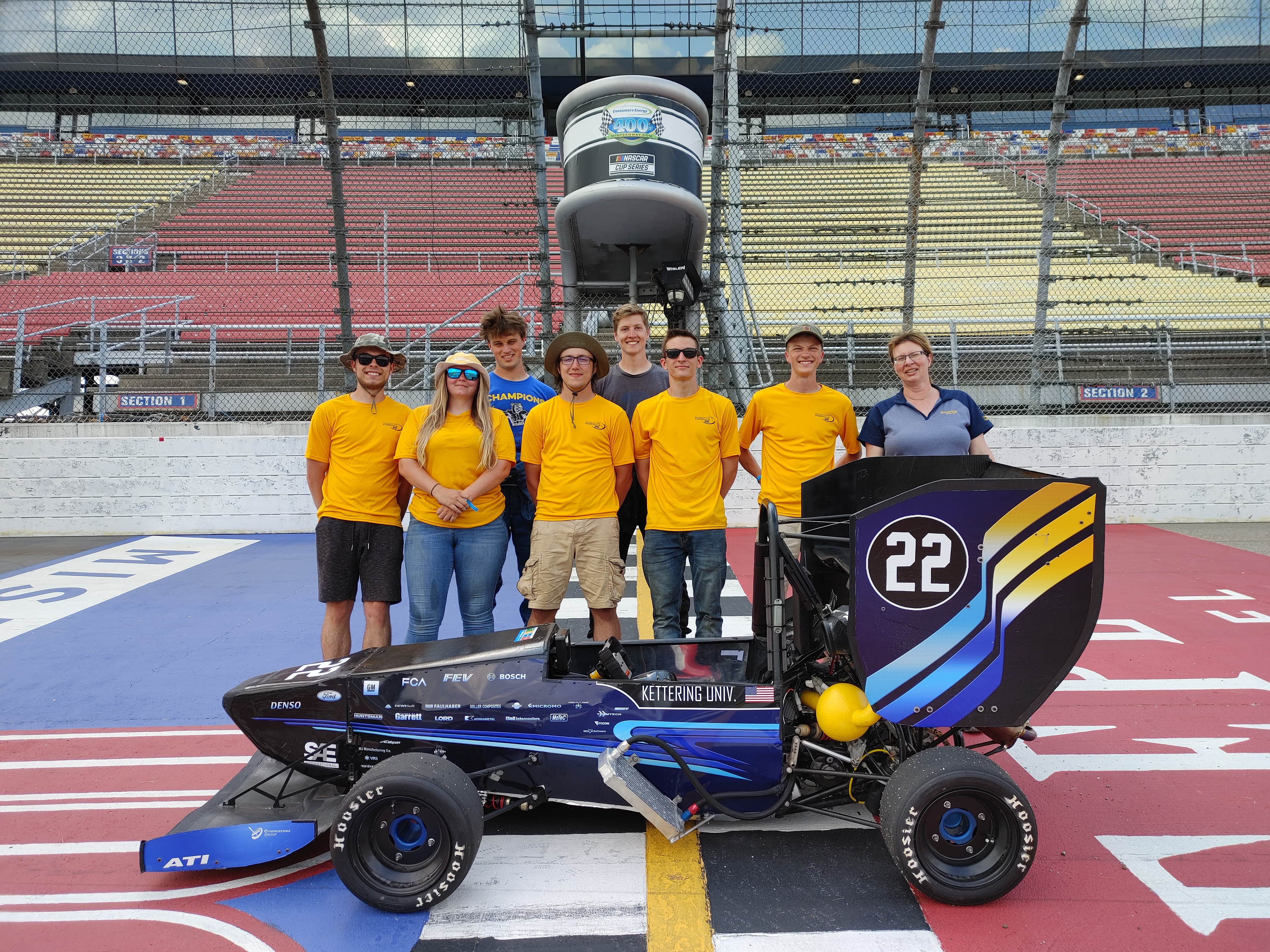 The Kettering University Formula SAE team and 2021 race car