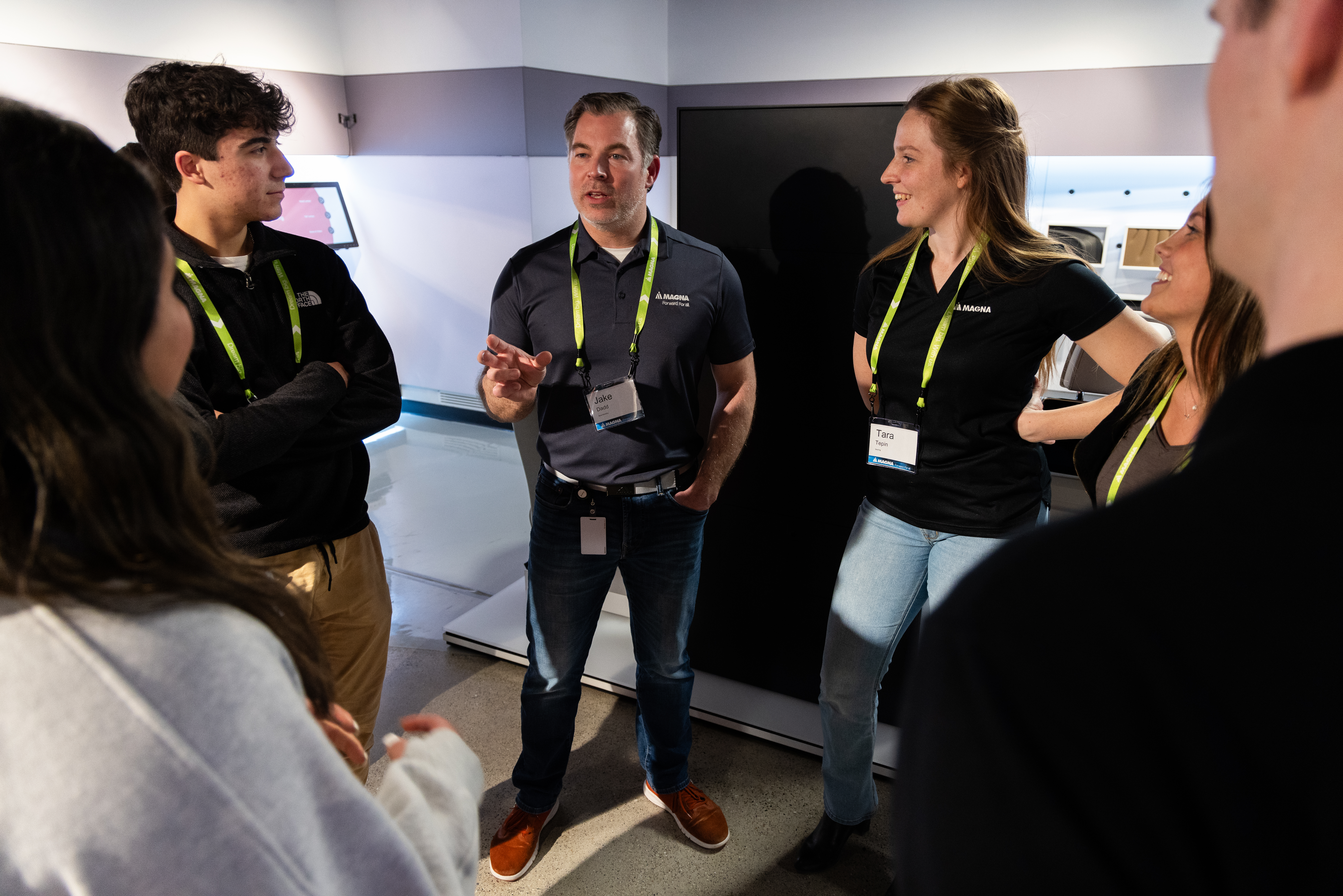 Students talking to MAGNA