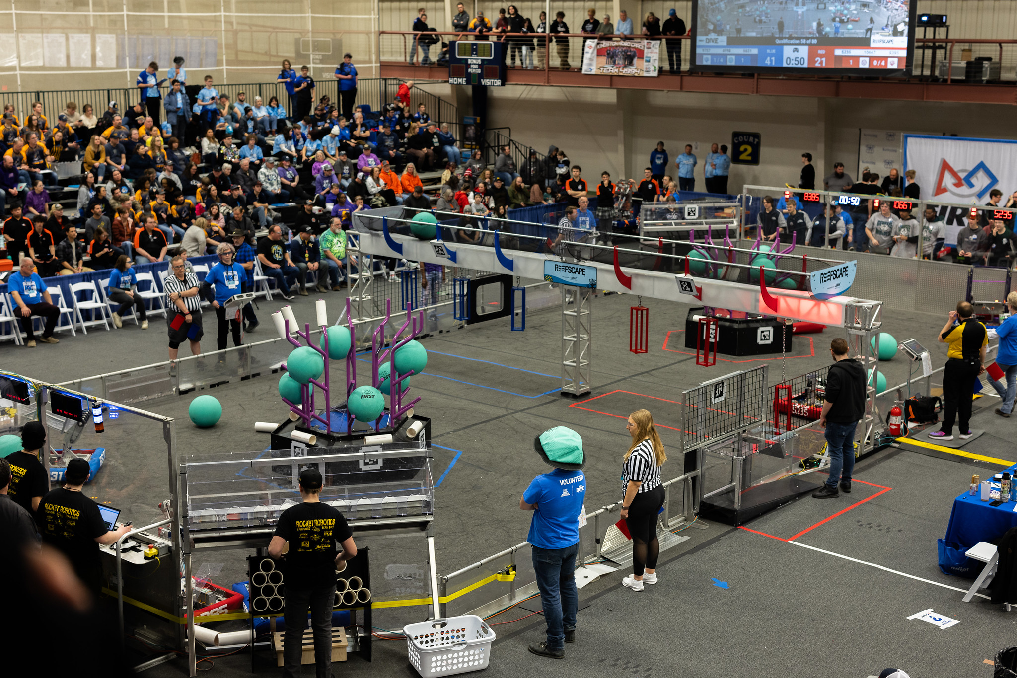 A view from the interior balcony of the Connie and Jim John Recreation Center, on the Kettering University Campus, during FIRST Robotics District Competition. 