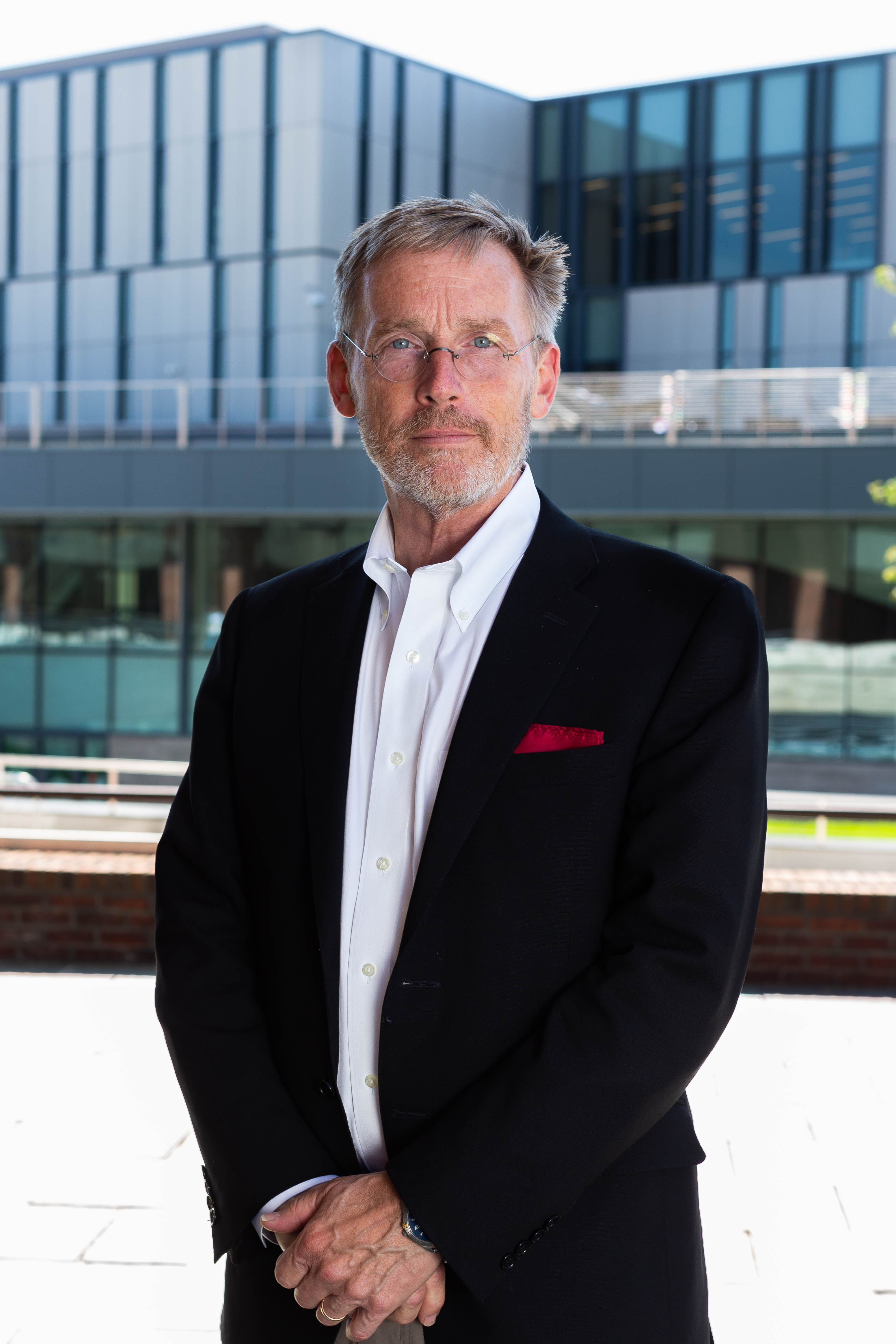 President Dr. Robert McMahan standing for a photo outside of the Learning Commons