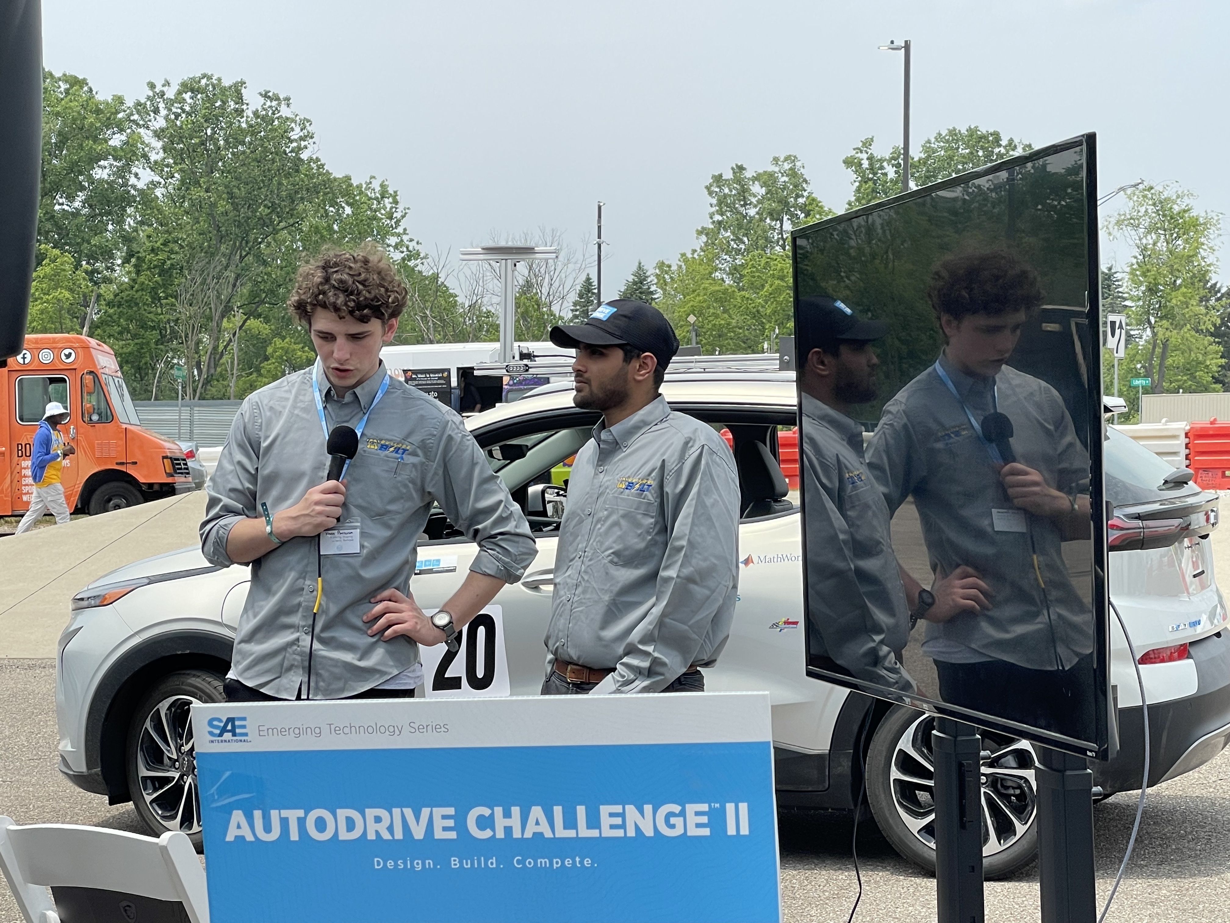 Kettering University students give a presentation at the AutoDrive II Challenge.