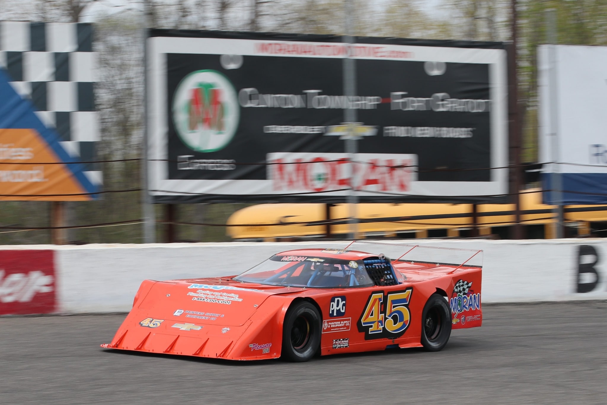 Kettering University student Conner Zbozien '26 racing his car around the track.
