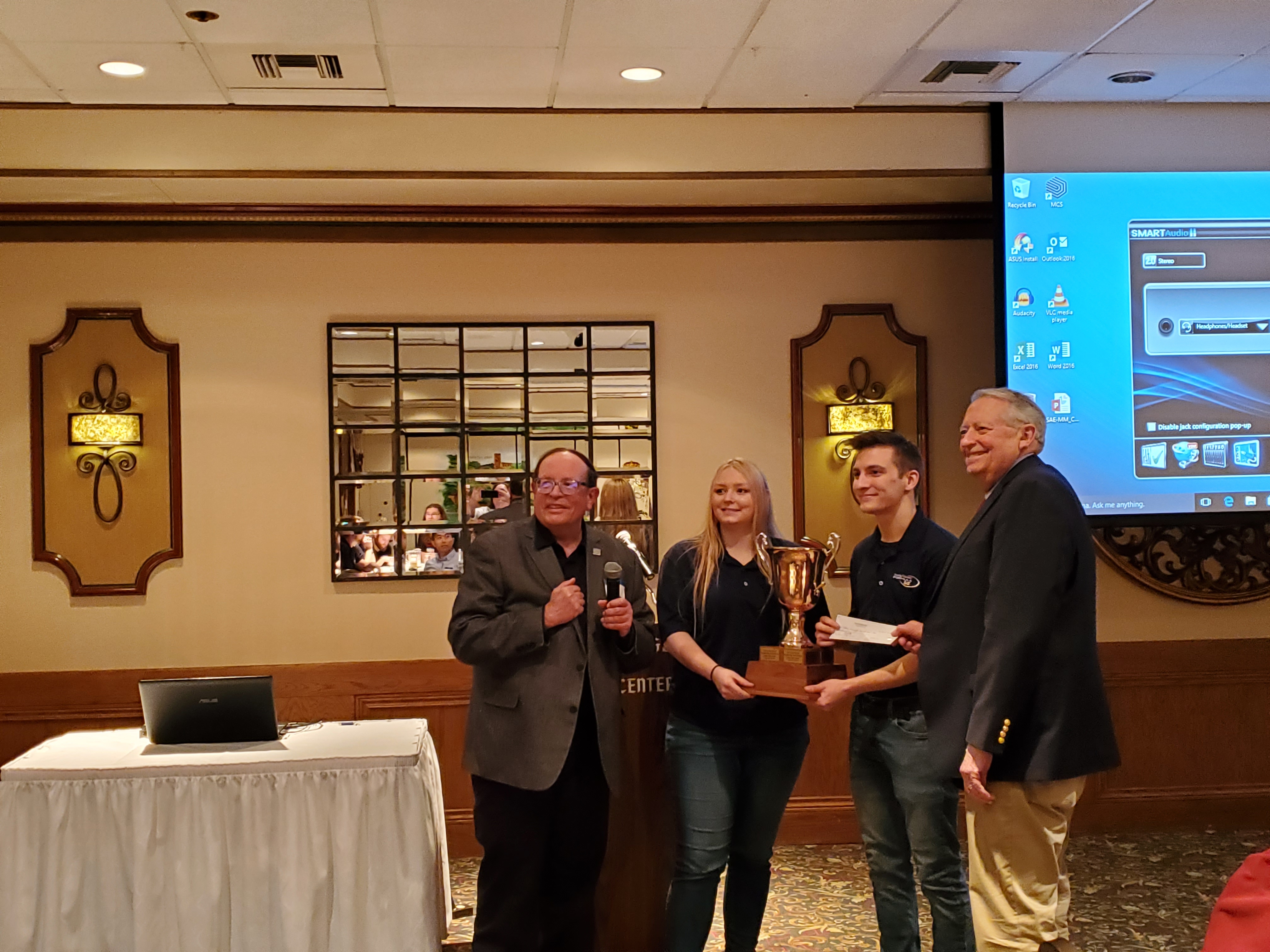 Members of the Kettering University Formula SAE team receiving the Collegiate Cup.