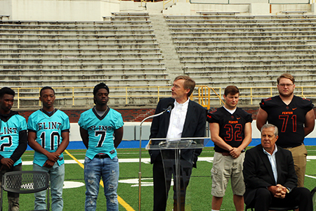 Kettering President Robert McMahan speaks during Vehicle City Gridiron Classic press conference