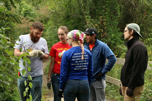 Kevin Koschnitzke ‘22 works with Kettering students at For-Mar Nature Preserve