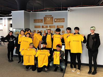 South Korean students learn how to screen print shirts while at Kettering