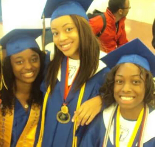 Rhonda Clarke, Phyllis Green and La Shyla Nelson during their graduation at Flint Southwestern.