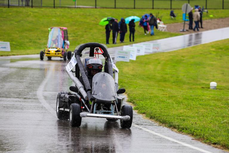 Students drive their go-karts during the Full-Scale Innovative Vehicle Design Challenge.
