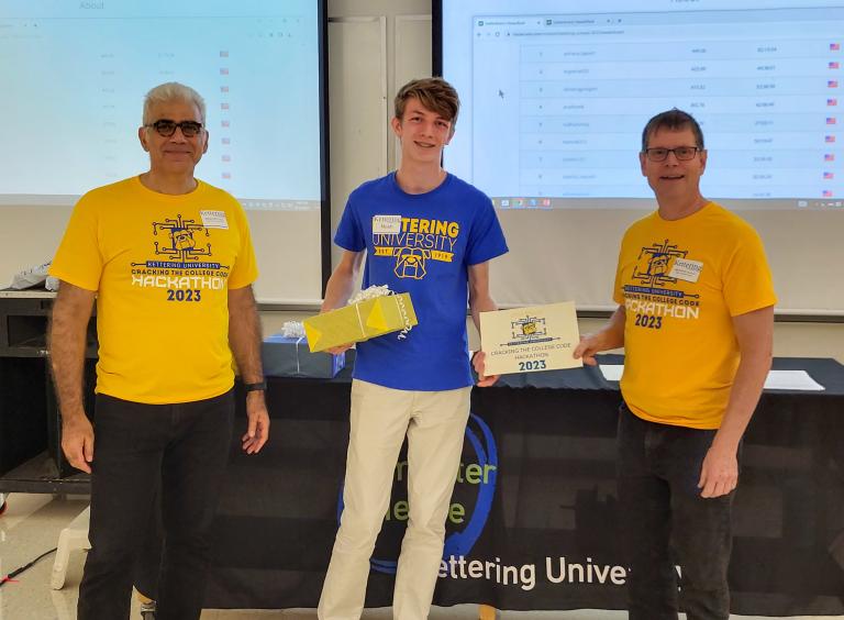 From left, Dr. Babak Elahi, Dean of the College of Sciences and Liberal Arts, Noah Gedraitis, second-place winner and Dr. Michael Farmer, Head of the Department of Computer Science at Kettering University.