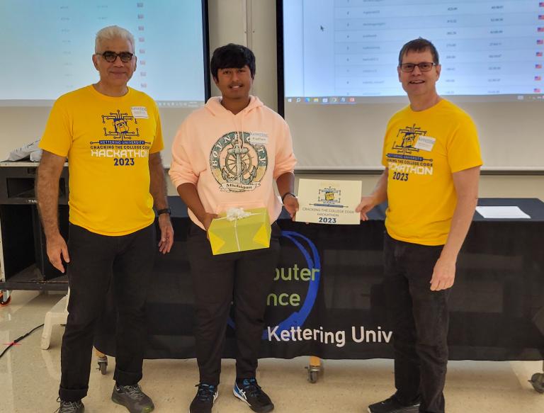 From left, Dr. Babak Elahi, Dean of the College of Sciences and Liberal Arts, Pradham Kuchipudi, fourth-place winner and Dr. Michael Farmer, Head of the Department of Computer Science at Kettering University.