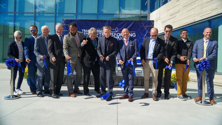 Officials cut the ribbon at the Learning Commons at Kettering University.