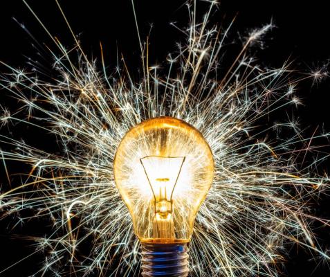 A light bulb filled with sparks
