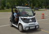 Students from the Intelligent Ground Vehicle team do a test drive before competition.