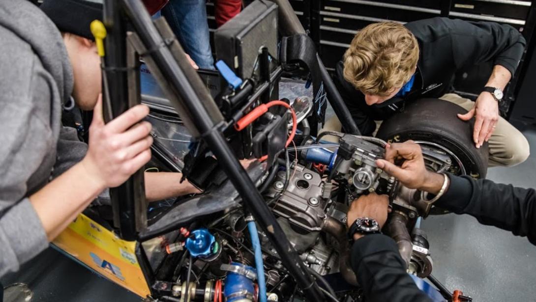 Students working in the SAE garage