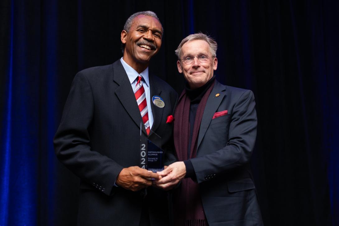 Ron Pirtle and Dr. McMahan shaking hands